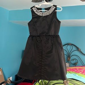 Black cocktail dress with pearls and rhinestones
